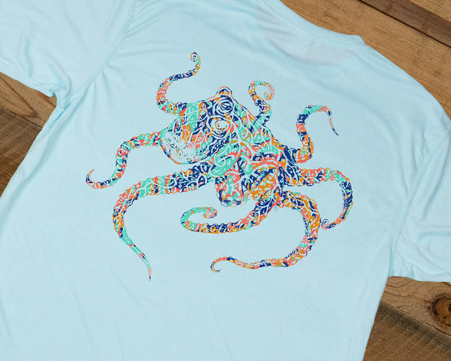 Octamang art design on the back of a men's arctic blue colored performance shortsleeve shirt