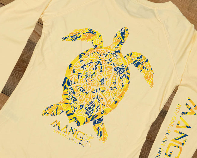 Loggerhead Turtley MANG design on the back of a women's yellow longsleeve performance shirt