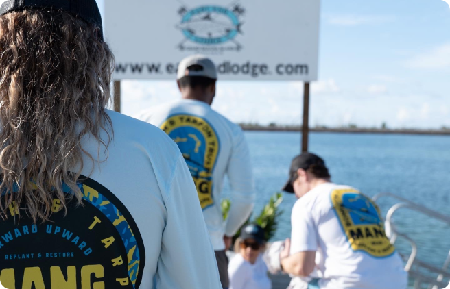 MANG volunteers traveling by boat to the next mangrove planting destination in the Bahamas