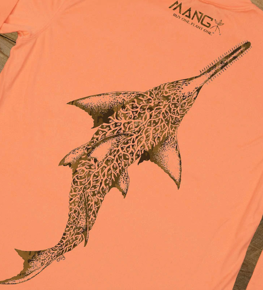 MANG Sawfish design on the back of an orange performance longsleeve shirt